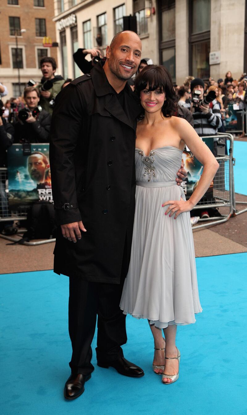 LONDON - APRIL 05:  Dwayne Johnson and Carle gugino arrive for the UK Premiere of Race to Witch Mountain at the Odeon West End in Leicester Square on April 5, 2009 in London, England.  (Photo by Tim Whitby/Getty Images)
