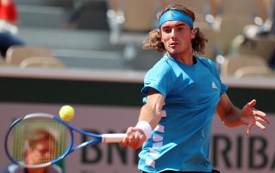 epa07609489 Stefanos Tsitsipas of Greece plays Hugo Dellien of Bolivia  during their men’s second round match during the French Open tennis tournament at Roland Garros in Paris, France, 29 May 2019.  EPA/SRDJAN SUKI