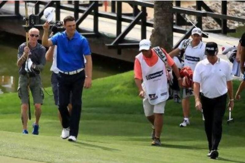 Martin Kaymer acknowledges the crowd after his first professional hole in one yesterday.