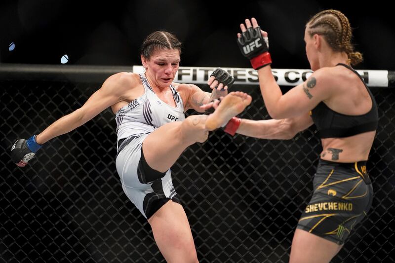 Lauren Murphy, left, throws a kick against Valentina Shevchenko. AP Photo