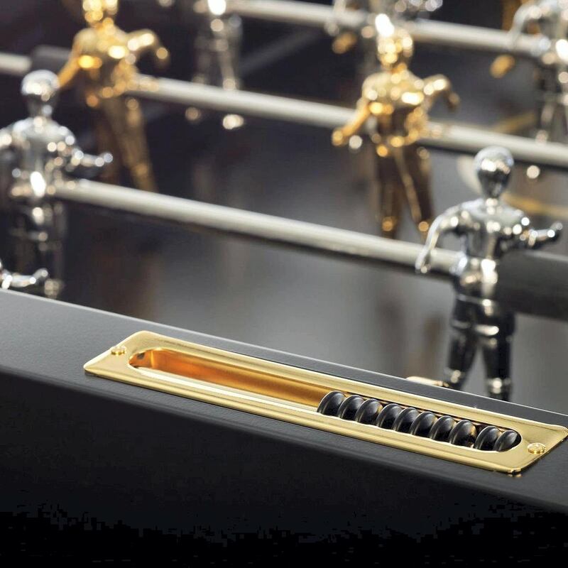Detail shot of RS2 gold football table, with the players dressed in gold and silver chrome plating.