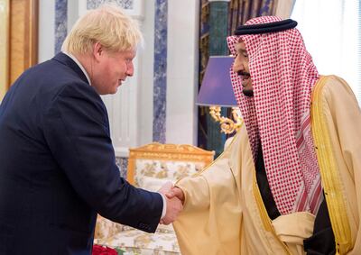 Saudi Arabia's King Salman Bin Abdulaziz Al-Saud meeting Boris Johnson in 2016 when the latter was UK foreign secretary. Now Prime Minister, Mr Johnson is hoping for significant investment in Britain from the kingdom. EPA