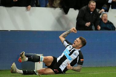 Newcastle United's English defender Kieran Trippier celebrates after scoring their third goal from a freekick during the English Premier League football match between Newcastle United and Everton at St James' Park in Newcastle-upon-Tyne, north east England on February 8, 2022. (Photo by Lindsey Parnaby / AFP) / RESTRICTED TO EDITORIAL USE. No use with unauthorized audio, video, data, fixture lists, club/league logos or 'live' services. Online in-match use limited to 120 images. An additional 40 images may be used in extra time. No video emulation. Social media in-match use limited to 120 images. An additional 40 images may be used in extra time. No use in betting publications, games or single club/league/player publications. / 