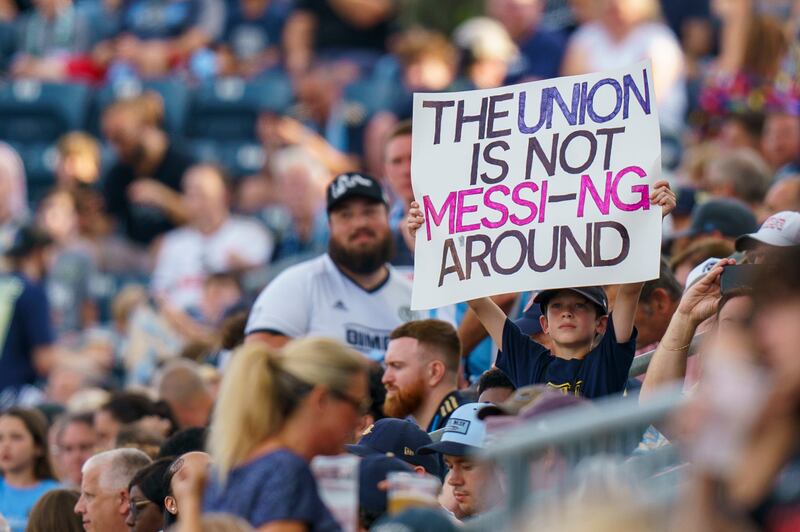 A Philadelphia Union fan holds up a sign. AP
