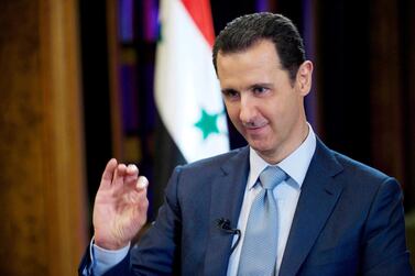 In this Feb. 10, 2015, file photo released by the Syrian official news agency SANA, Syrian President Bashar Assad gestures during an interview in Damascus, Syria. AP