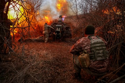 Ukrainian serviceman fire a D-30 howitzer towards Russian troops at a position in a front line in Kherson region. RFE