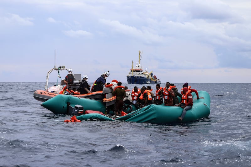 Help is on the way: the migrants spot the 'Sea Watch-3' rescue boat.