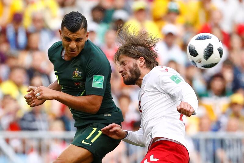 Australia's Andrew Nabbout in action with Denmark's Lasse Schone. Michael Dalder / Reuters