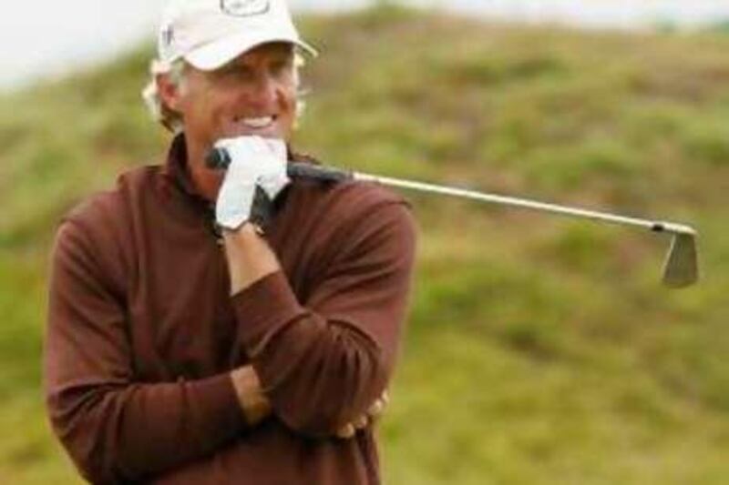 Greg Norman of Australia reacts on the ninth fairway during the second round of the British Open Golf championship, at the Royal Birkdale golf course, Southport, England, Friday, July 18, 2008. (AP Photo/Paul Thomas) *** Local Caption ***  RBI131_British_Open_Golf.jpg