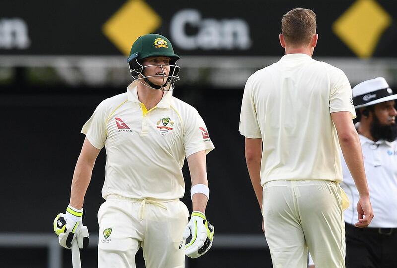 epa06349299 Australian captain Steve Smith speaks towards England bowler jake Ball after hitting a four from his bowling on Day 3 of the First Test match between Australia and England at the Gabba in Brisbane, Australia, 25 November 2017.  EPA/DAVE HUNT EDITORIAL USE ONLY IMAGES TO BE USED FOR NEWS REPORTING PURPOSES ONLY, NO COMMERCIAL USE WHATSOEVER, NO USE IN BOOKS WITHOUT PRIOR WRITTEN CONSENT FROM AAP AUSTRALIA AND NEW ZEALAND OUT