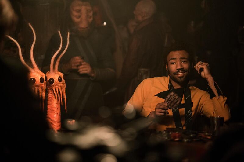 This image released by Lucasfilm shows Donald Glover as Lando Calrissian in a scene from "Solo: A Star Wars Story." (Jonathan Olley/Lucasfilm via AP)