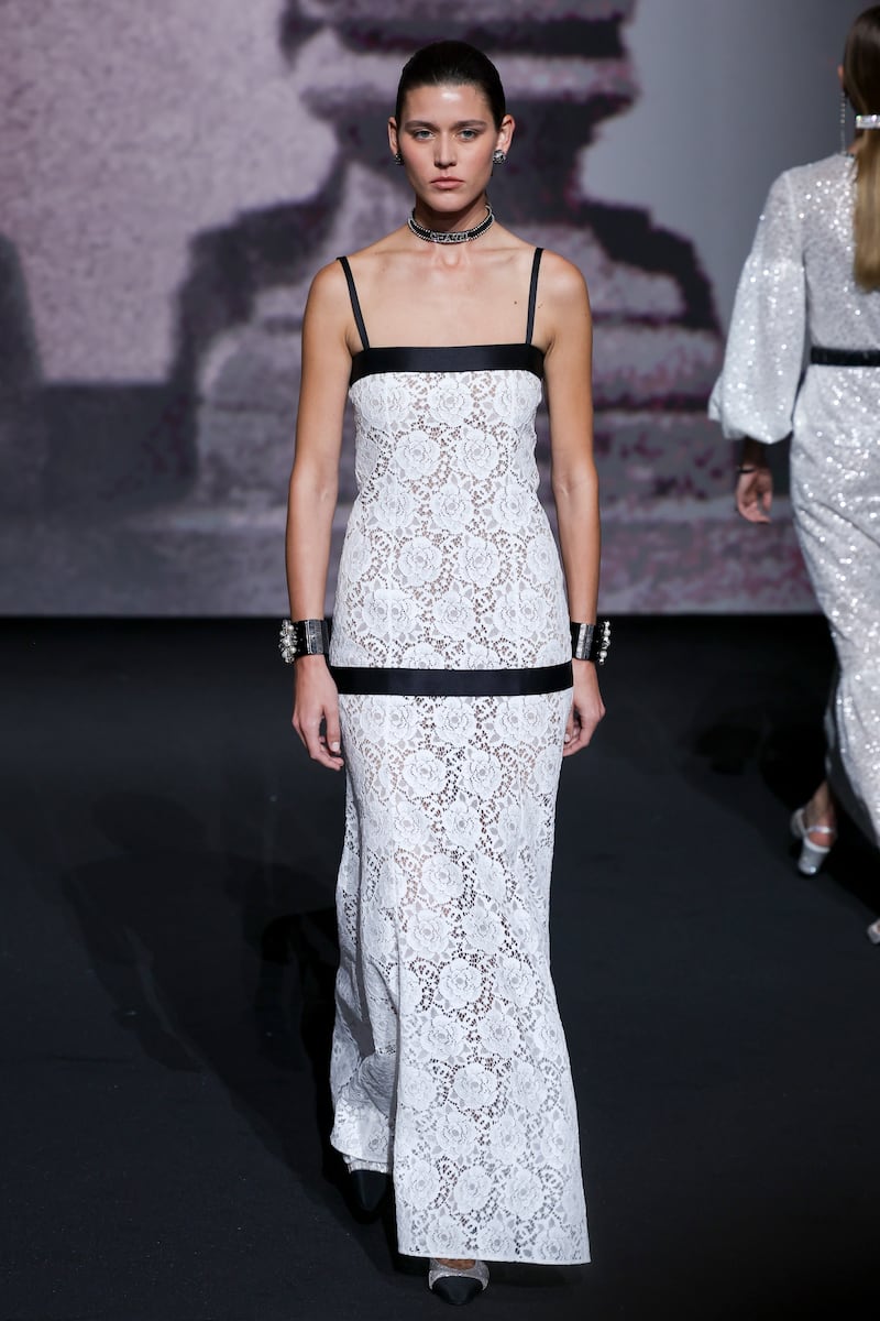 A floor-length lace dress at Chanel spring/summer 2023. Getty 