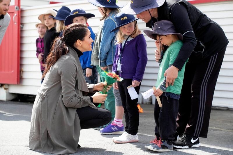 Meghan, Duchess of Sussex talks to Joe Young following a meeting with young people from a number of mental health projects operating in Wellington. AP