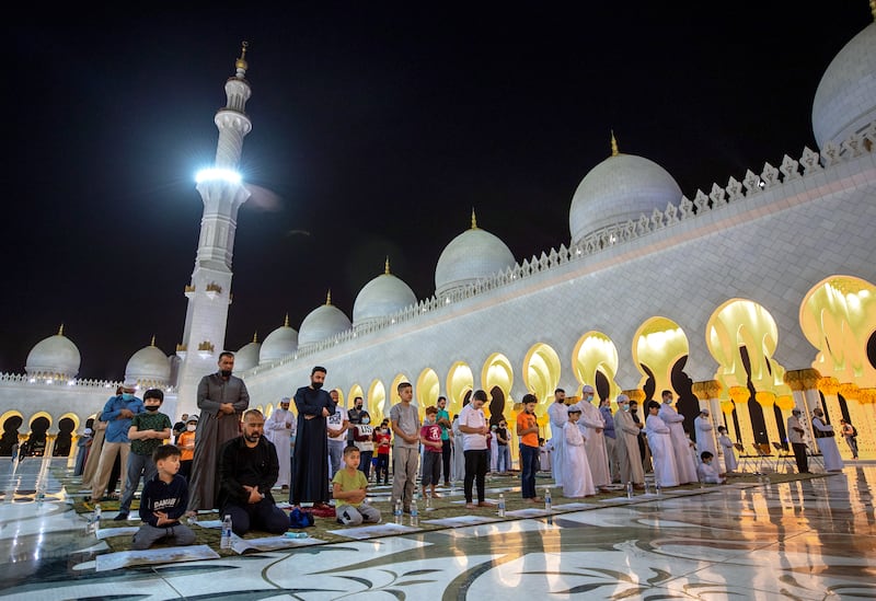 Isha prayer at Sheikh Zayed Grand Mosque in Abu Dhabi, where many say they feel privileged to pray in one of the world's most recognisable places of worship. All photos: Victor Besa / The National