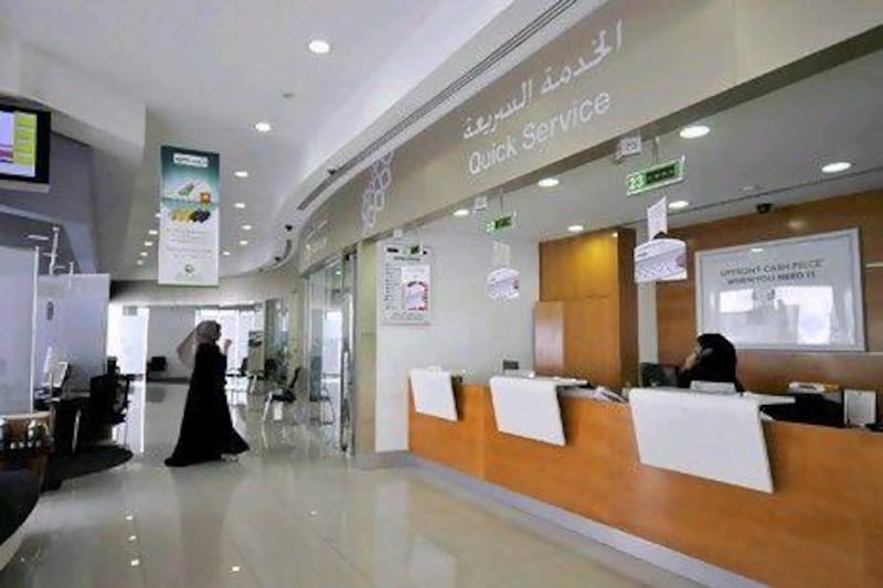 An employee is seen inside one of Dubai Islamic Bank's women-only branches in Deira, October 26, 2010. Financial institutions in the conservative Gulf Arab region, where many women are reluctant to mix with men outside their families, are tapping into the niche, with women-only bank branches and investment funds mushrooming. Picture taken October 26, 2010. To match Feature ISLAMICFINANCE-WOMEN/ REUTERS/Jumana El Heloueh (UNITED ARAB EMIRATES - Tags: BUSINESS SOCIETY) *** Local Caption *** DUB01_ISLAMICFINANC_1027_11.JPG