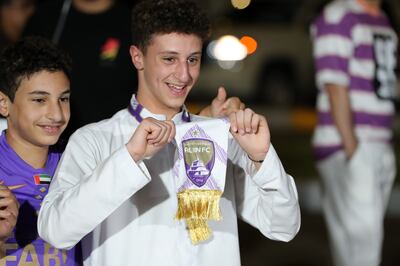 An Al Ain displays his pride in his team's exploits at Friday's ADIB Cup final, in which they lost out to Al Wahda. Chris Whiteoak / The National
