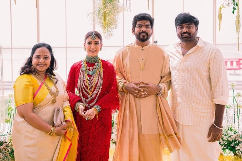 The couple with actor Vijay Sethupathi and his wife Jessie.
