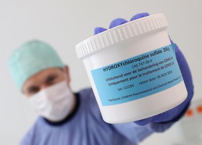 FILE PHOTO: A pharmacist displays a box of Hydroxychloroquine at the CHR Centre Hospitalier Regional de la Citadelle Hospital amid the coronavirus disease (COVID-19) in Liege, Belgium, June 16, 2020. REUTERS/Yves Herman/File Photo