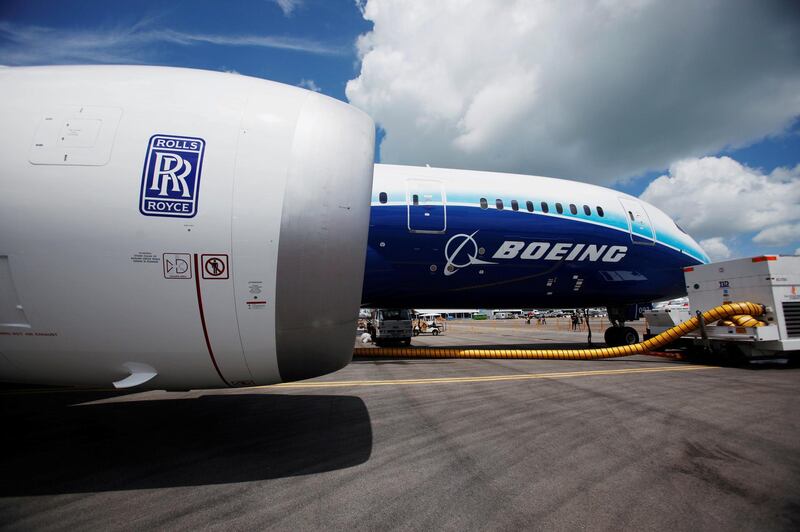 FILE PHOTO: A view of one of two Rolls Royce Trent 1000 engines on a Boeing 787 Dreamliner during a media tour ahead of the Singapore Airshow on February 12, 2012.   REUTERS/Edgar Su/File Photo