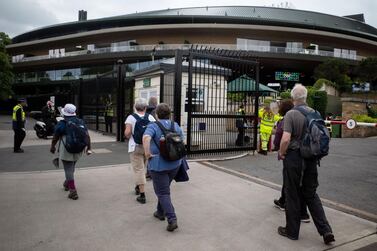 Visitors outside the All England Club where Wimbledon begins on June 28. Mark Chilvers for The National
