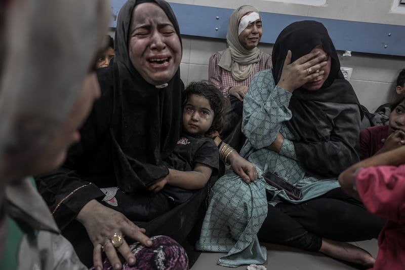 Injured Palestinians at Gaza's Al Shifa Hospital on October 17. More than 10,000 Palestinians – including thousands of children – have been killed by Israeli air and ground operations in the past month. Anadolu Agency