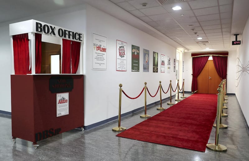 DUBAI, UNITED ARAB EMIRATES , August 9 – 2020 :- View of the entrance of the auditorium at the Dubai British School in Jumeirah Park in Dubai. New Covid safety setup in different areas of the school such as hand sanitizer , safety message, social distancing stickers pasted on the floor, thermal cameras will be installed at the entrance of the school. School will open on 30th August. (Pawan Singh / The National) For News/Online/Instagram. Story by Kelly