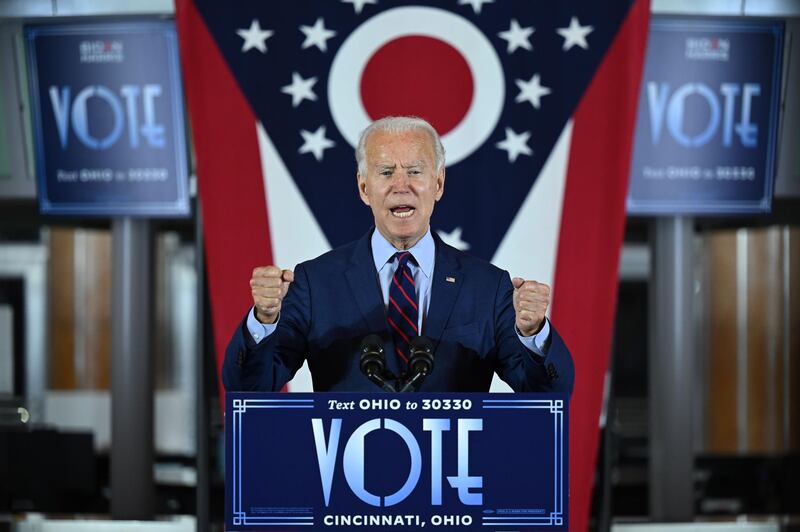 TOPSHOT - Democratic Presidential candidate and former Vice President Joe Biden delivers remarks at a voter mobilization event in Cincinnati, Ohio, on October 12, 2020, where he will speak to the importance of Ohioans making their voices heard this election. / AFP / JIM WATSON
