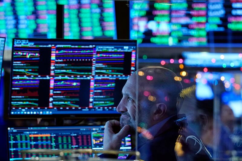 A trader at the New York Stock Exchange. From New York to Sydney to Frankfurt, market weaknesses long hidden by ultra-easy monetary policies are being. AP