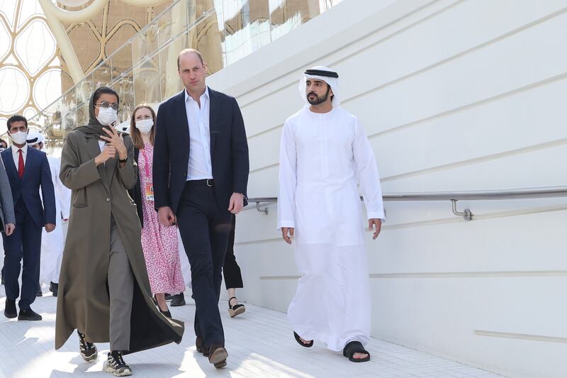 Sheikh Hamdan bin Mohammed, right, and Noura Al Kaabi, Minister of Culture and Youth, accompany Prince William on the tour. Getty