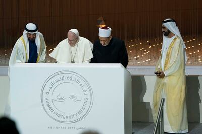 ABU DHABI, UNITED ARAB EMIRATES - February 4, 2019: Day two of the UAE papal visit - HH Sheikh Mohamed bin Rashid Al Maktoum, Vice-President, Prime Minister of the UAE, Ruler of Dubai and Minister of Defence (R), HH Sheikh Mohamed bin Zayed Al Nahyan, Crown Prince of Abu Dhabi and Deputy Supreme Commander of the UAE Armed Forces (L), His Holiness Pope Francis, Head of the Catholic Church (2nd L) and His Eminence Dr Ahmad Al Tayyeb, Grand Imam of the Al Azhar Al Sharif (2nd R), sign a commemorative stone, at The Founders Memorial
( Hamad Al Mansoori / Ministry of Presidential Affairs )
---