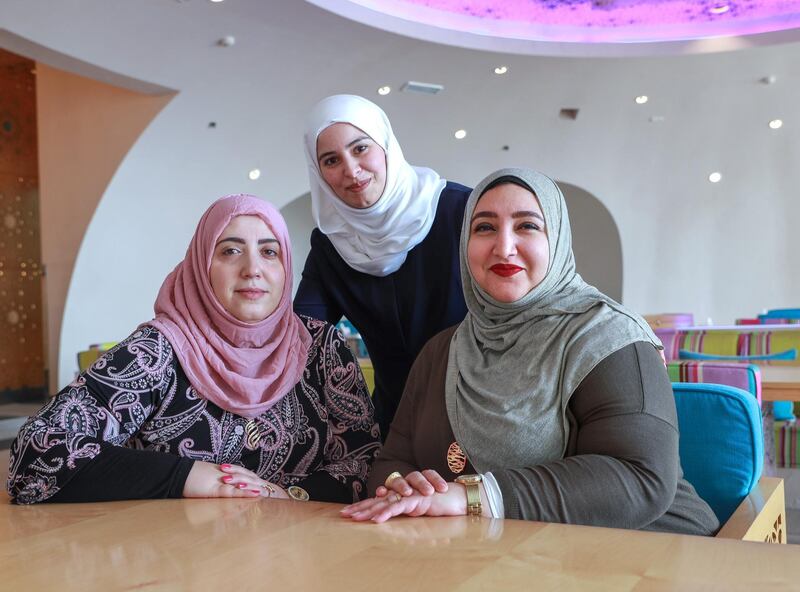 Abu Dhabi, U.A.E., July 7, 2018.  The Abu Dhabi Ladies Fourme, a group of expats and local ladies and mothers living in Abu Dhabi who get engaged in social activities and participate in various awareness workshops through establishing an online community platform.   (L-R)  Lisa Kanso, Hanan Wehbe and Naglaa Fathy.
Victor Besa / The National
Section:  NA
Reporter:  Ruba Haza