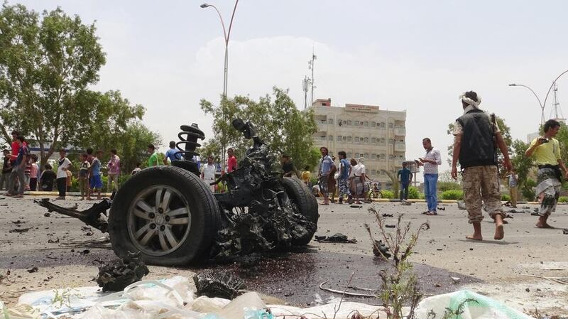 Members of the pro-government Southern Resistance gather at the site of a car bomb attack in the southern port city of Aden on July 31, 2016. Reuters