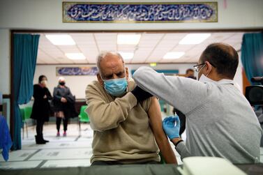 Masud Ahmad, 79, receives an injection of the Oxford/AstraZeneca vaccine at the Al-Abbas Mosque, Birmingham. Getty Images