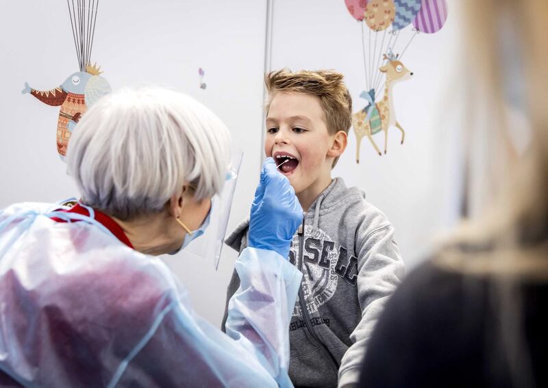 A child undergoes a coronavirus test in a special children's testing centre in Amsterdam, The Netherlands. EPA