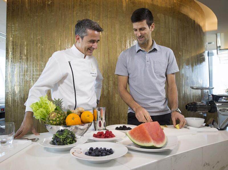 Novak Djokovic with chef Maxime Luvara at Bab Al Yam restaurant at the Burj Al Arab in Dubai. Photo Courtesy / Dubai Duty Free Tennis Championships