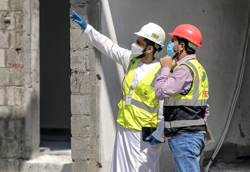 Abu Dhabi, United Arab Emirates, September 27, 2020.  Saif Abdul Hay from the Abu Dhabi City Municipality inspects safety standards of a construction site at the Al Raha Gardens, Abu Dhabi.
Victor Besa/The National
Section:  NA
Reporter:  Haneen Dajani