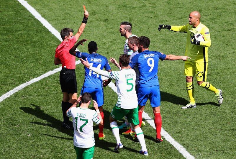 Shane Duffy of Republic of Ireland is shown a red card by referee Nicola Rizzoli. Lars Baron / Getty Images