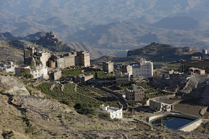 A general view shows buildings surrounding coffee fields at a village in the mountain region of Haraz, Yemen. EPA
