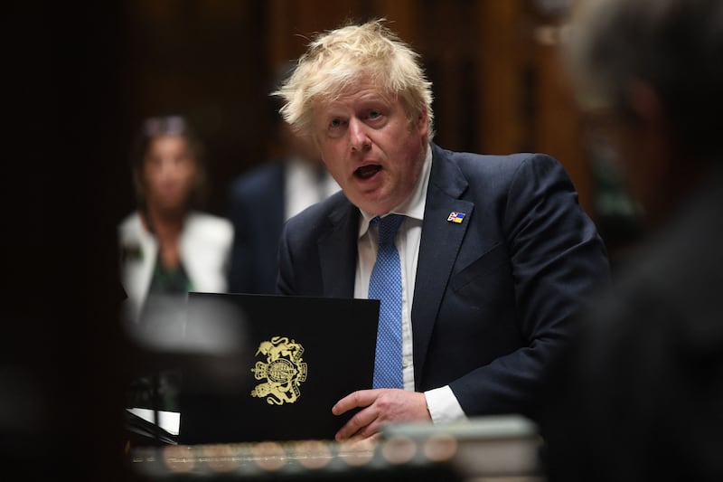 Mr Johnson apologises to MPs in the House of Commons in London, in April, having been fined after a police probe for attending a party during coronavirus lockdowns imposed by his own government. AFP