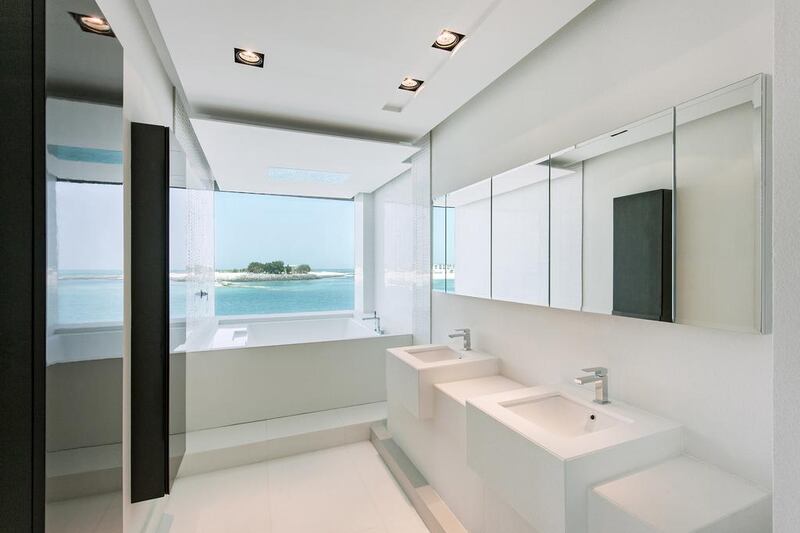 Even the bathrooms feature a sea view. Courtesy Gulf Sotheby’s International Realty