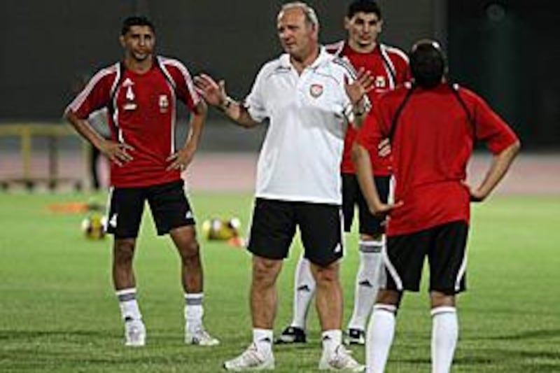 Dominique Bathenay watches over training at the Al Wasl club in Dubai before tonight's friendly with Germany.