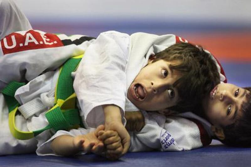 ABU DHABI, UNITED ARAB EMIRATES -   April 12, 2012 -  Jiu-Jitsu action from the World Kids Championship, which kicked off the start of the World Professional Jiu-Jitsu Championship in Abu Dhabi on Thursday, April 12, 2012 at ADNEC.    ( DELORES JOHNSON / The National )