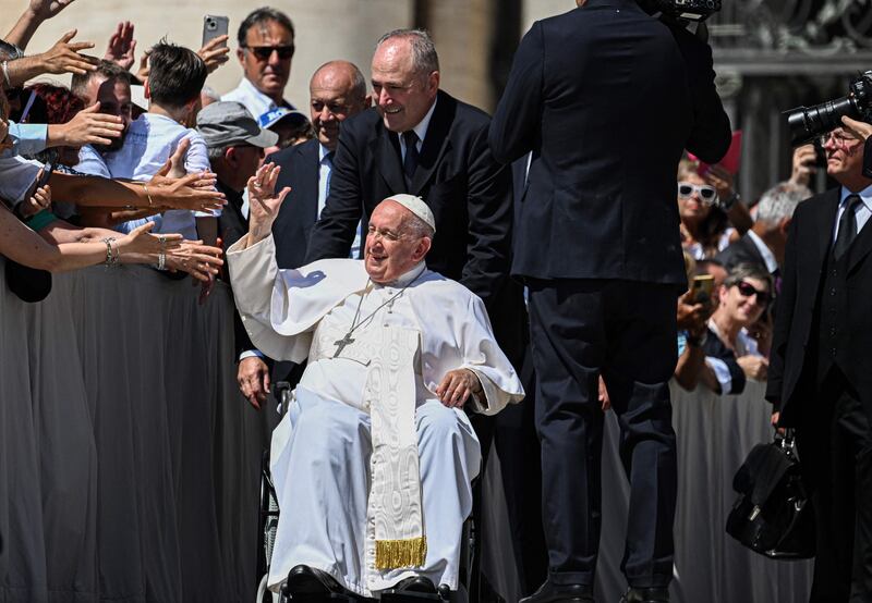Pope Francis waves to the public at St  Peter's Square in the Vatican before undergoing surgery on an abdominal hernia at Gemelli Hospital, Rome. AFP