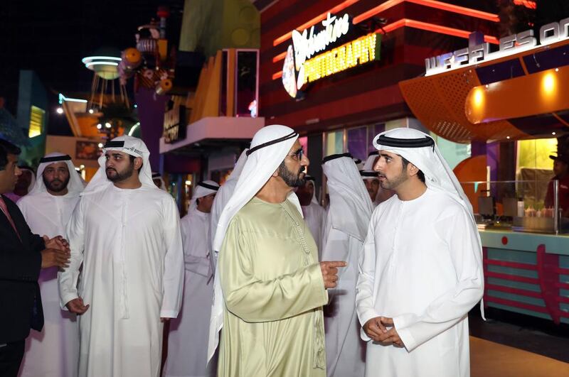 Sheikh Mohammed bin Rashid, Sheikh Hamdan bin Mohammed and Sheikh Maktoum bin Mohammed tour the IMG Worlds of Adventure theme park on the day of its inauguration. Wam