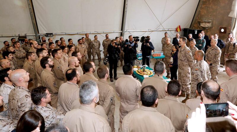 King Felipe greeting Spanish troops during his visit to their military base in Baghdad. EPA