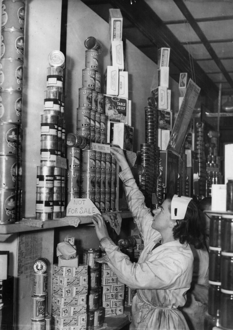 Due to two weeks’ delay in the delivery of tinned food, 'not for sale' signs are placed on items in this Co-op shop in St John's Wood Terrace, London, in 1941