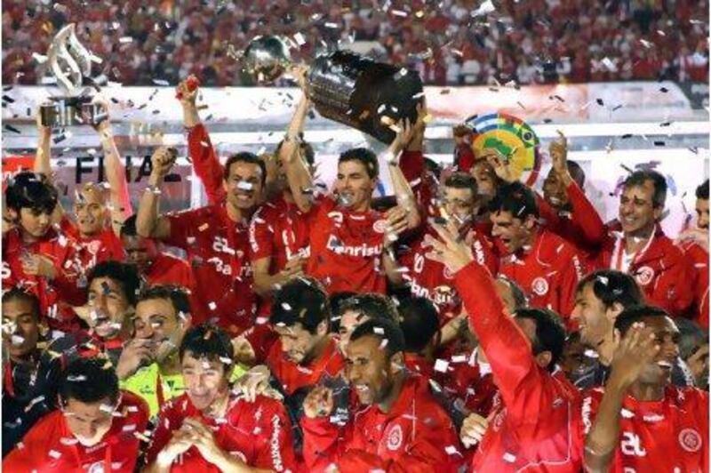 With the Copa Libertadores held aloft, Internacional players celebrate after beating Mexico's Chivas 3-2 on aggregate in the final. 

Jefferson Bernardes / AFP