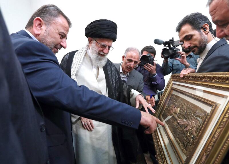 Iran's Supreme Leader Ayatollah Ali Khamenei meets Hamas deputy Saleh Arouri, left, and delegation in Tehran, Iran.  EPA