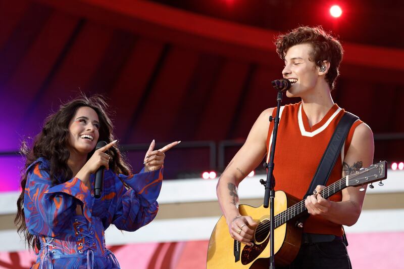 Camila Cabello, left, and Shawn Mendes perform on the Central Park stage. EPA