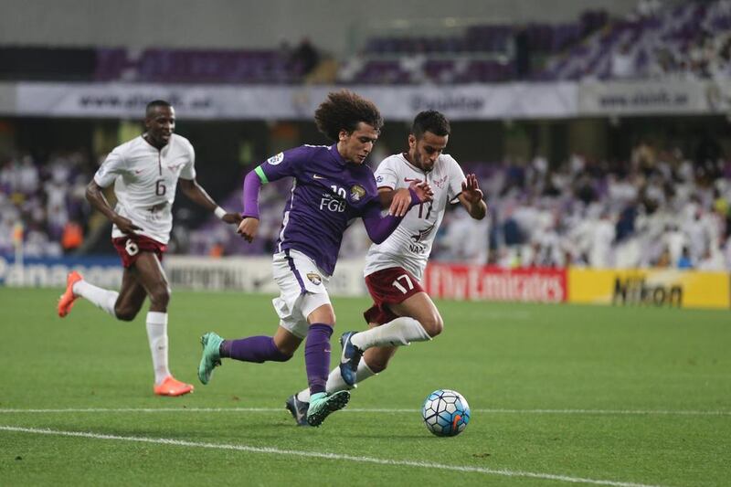 Omar Abdulrahman of Al Ain (centre) in action during the AFC Asian Champions League football match between Al Ain and El Jaish, at Hazza Bin Zayed Stadium, Al Ain. 24 February 2016. Photo: Anas Kanni / Al Ittihad